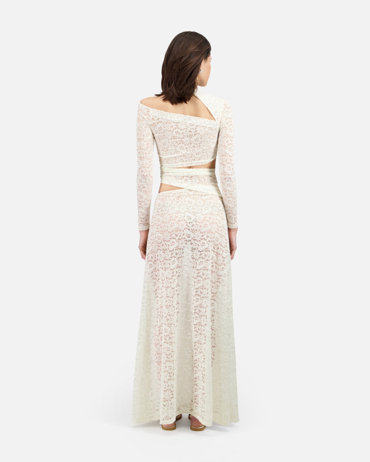 LONG DRESS IN LACE WITH ASYMMETRIC CUT-OUTS
