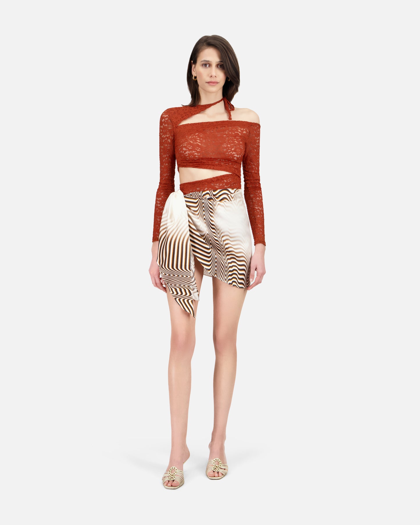 LONG SLEEVE LACE TOP WITH ASYMMETRIC CUT-OUTS