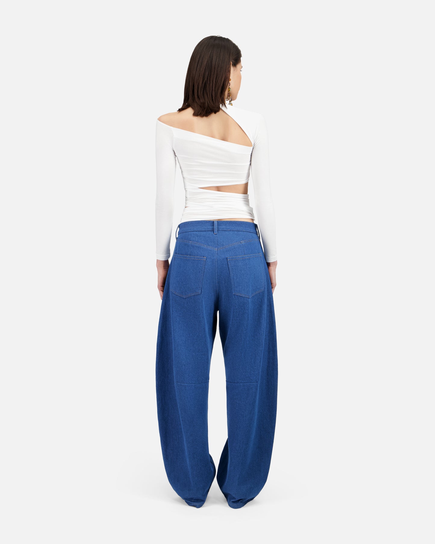 LONG SLEEVE TOP WITH ASYMMETRIC CUT-OUTS
