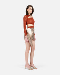 LONG SLEEVE LACE TOP WITH ASYMMETRIC CUT-OUTS